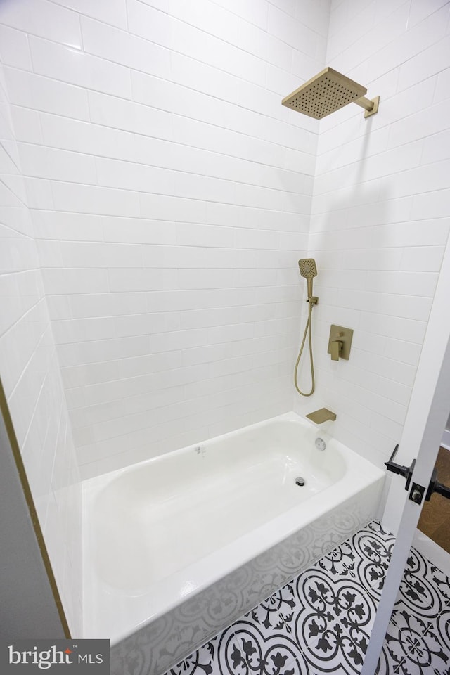 bathroom featuring tile patterned floors and shower / bath combination