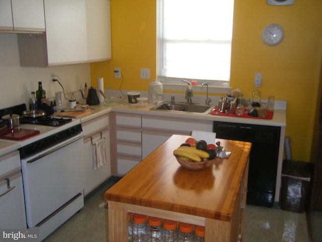 kitchen featuring butcher block countertops, a sink, black dishwasher, white cabinetry, and white gas range