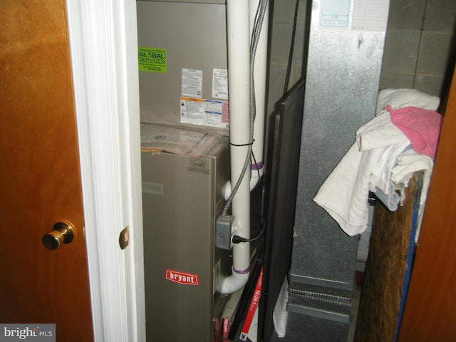 utility room with heating unit