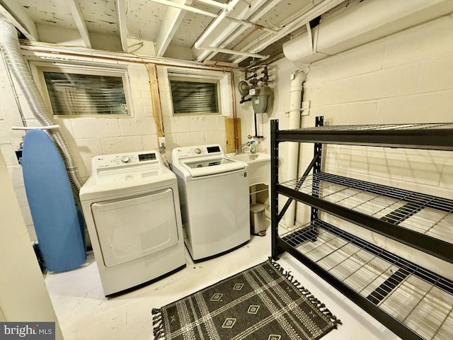 laundry area featuring laundry area and washer and clothes dryer