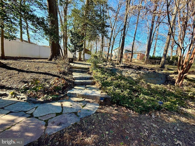 view of yard featuring fence