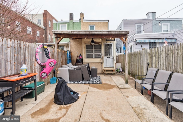 3144 Gaul St, Philadelphia, PA 19134 - back of house with an outdoor hangout area, stucco siding, a fenced backyard, ceiling fan, and a patio area