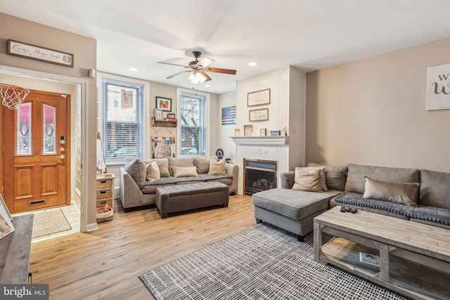 3144 Gaul St, Philadelphia, PA 19134 - living room with a fireplace, a ceiling fan, light wood-style flooring, and recessed lighting