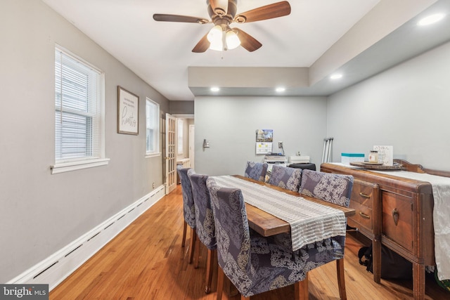 3144 Gaul St, Philadelphia, PA 19134 - dining room with baseboards, ceiling fan, light wood-type flooring, and baseboard heating