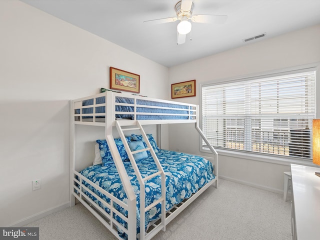 bedroom featuring visible vents, ceiling fan, carpet, and baseboards