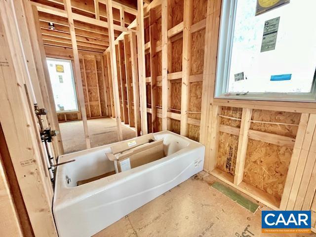 full bathroom featuring a tub