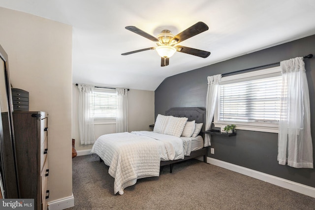 bedroom with baseboards, lofted ceiling, carpet, and a ceiling fan