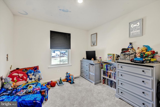 game room featuring baseboards and carpet floors