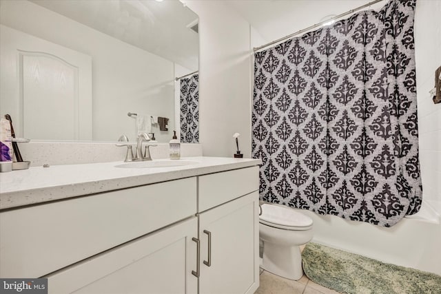 full bath with vanity, visible vents, tile patterned floors, toilet, and shower / tub combo with curtain