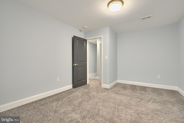 unfurnished bedroom with visible vents, baseboards, and carpet floors