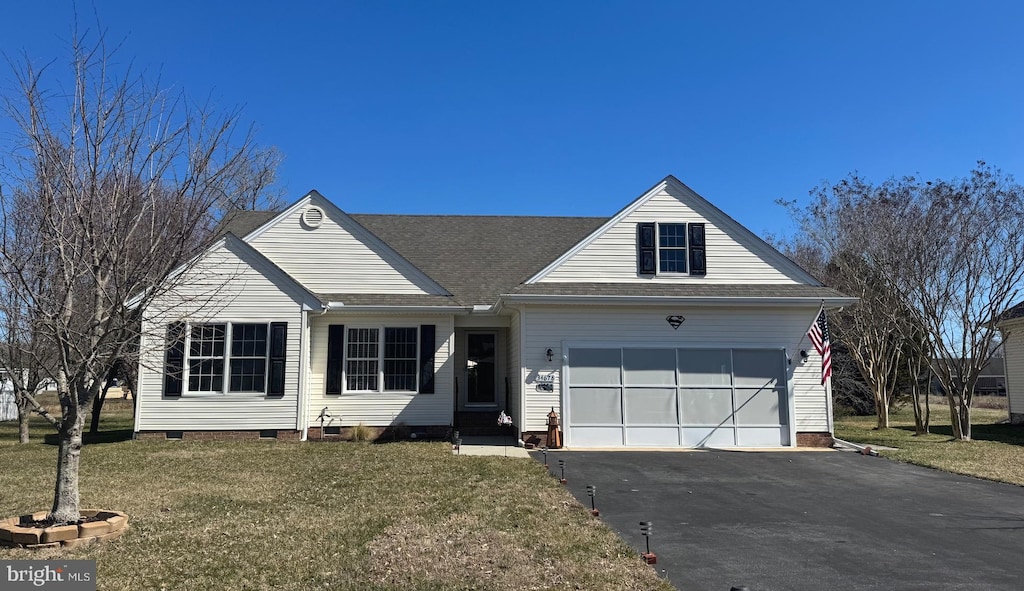 view of front of property with aphalt driveway, a garage, a front yard, and crawl space