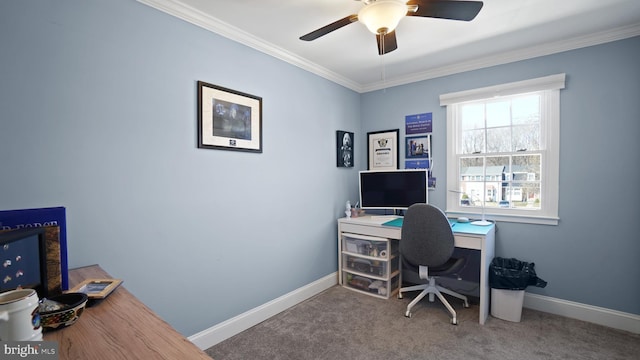 office area with carpet, a ceiling fan, crown molding, and baseboards