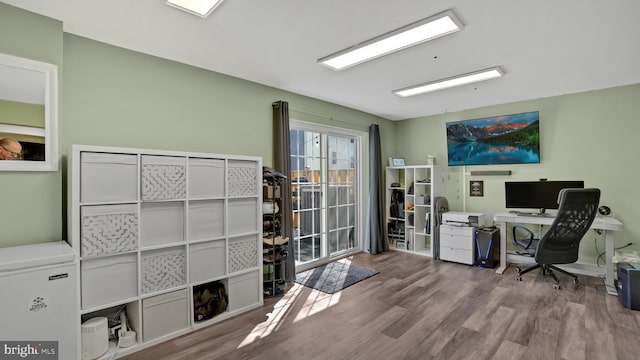 office area with wood finished floors