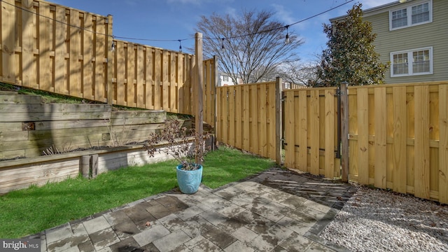 view of patio featuring a fenced backyard