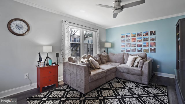 living room featuring ornamental molding, baseboards, ceiling fan, and wood finished floors