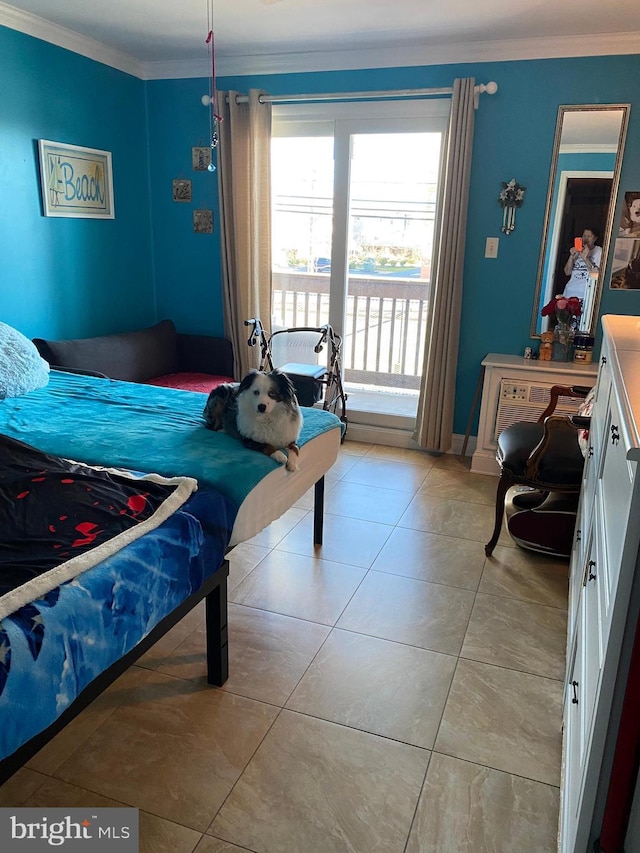 bedroom with crown molding, light tile patterned flooring, and access to exterior