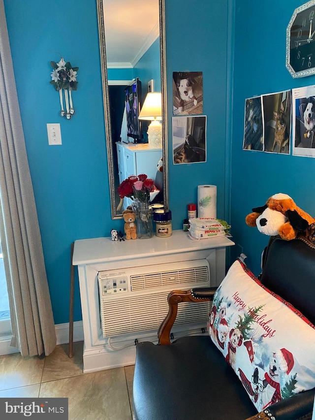 bedroom featuring tile patterned flooring, a wall mounted air conditioner, and crown molding