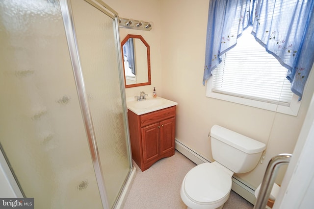 bathroom with a baseboard radiator, toilet, a stall shower, and vanity