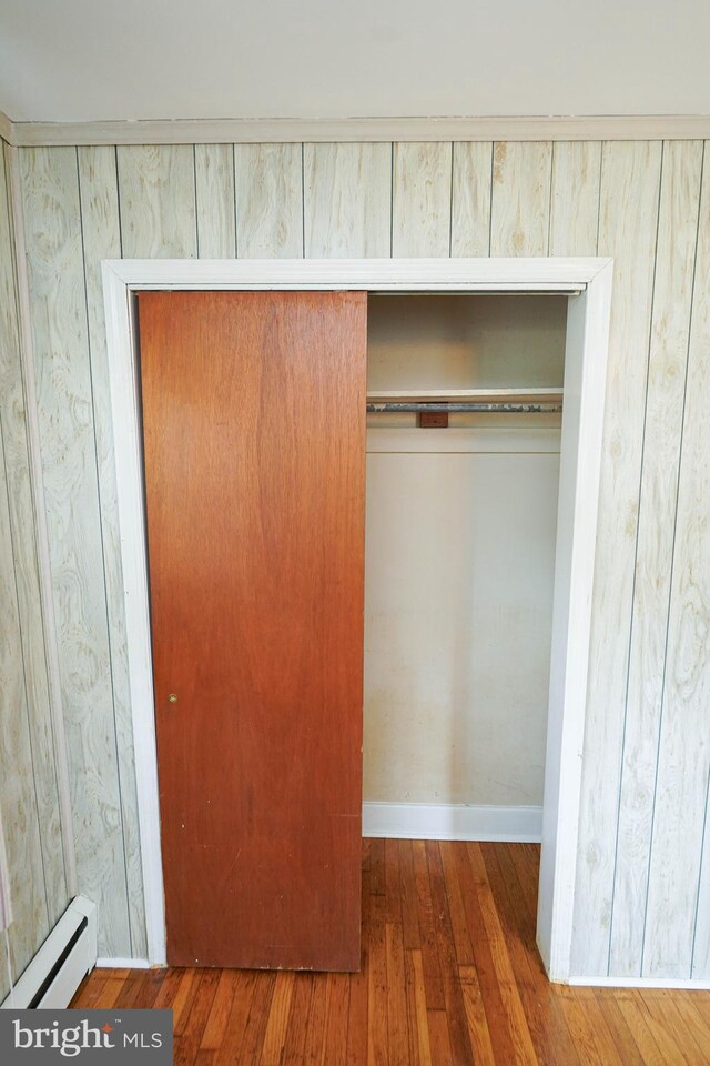 closet with a baseboard radiator