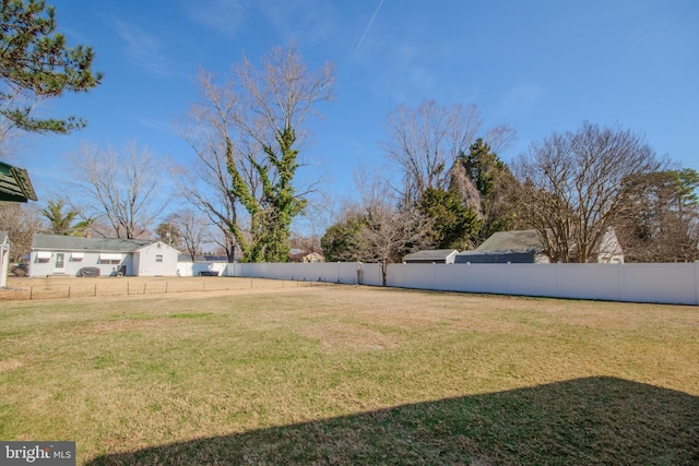 view of yard featuring fence