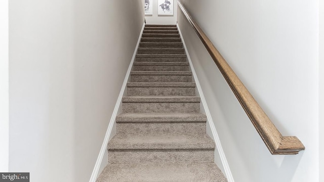 stairway with baseboards