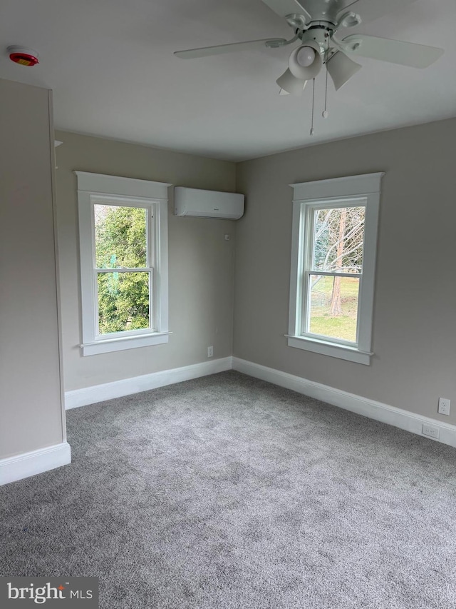 406 Swedesboro Rd, Gibbstown, NJ 08027 - carpeted spare room with an AC wall unit, baseboards, and ceiling fan