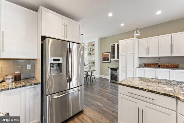 kitchen featuring backsplash, stainless steel fridge with ice dispenser, beverage cooler, white cabinets, and dark wood-style flooring