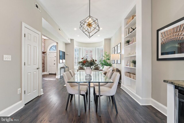 dining room featuring visible vents, baseboards, recessed lighting, an inviting chandelier, and dark wood-style floors