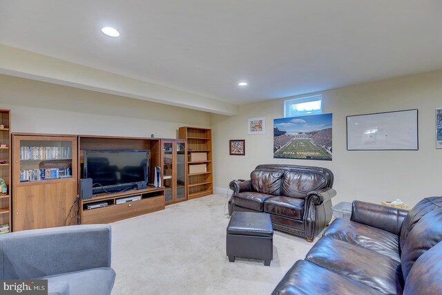 living room with recessed lighting and carpet floors