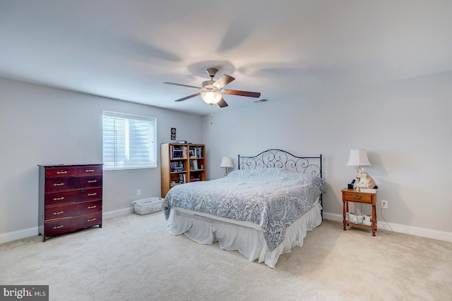 bedroom with visible vents, ceiling fan, baseboards, and carpet floors