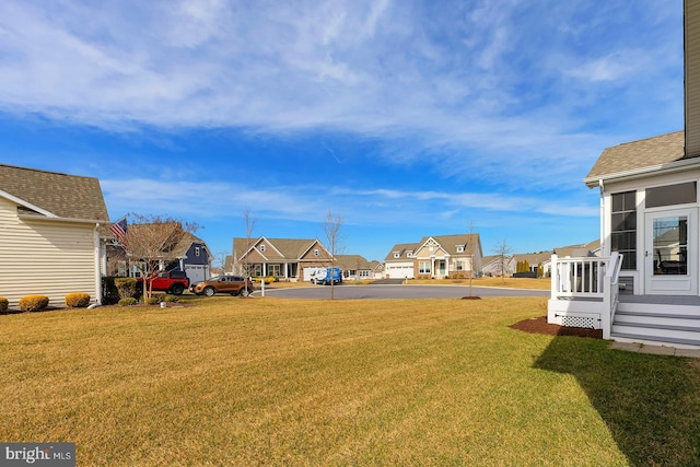 view of yard with a residential view