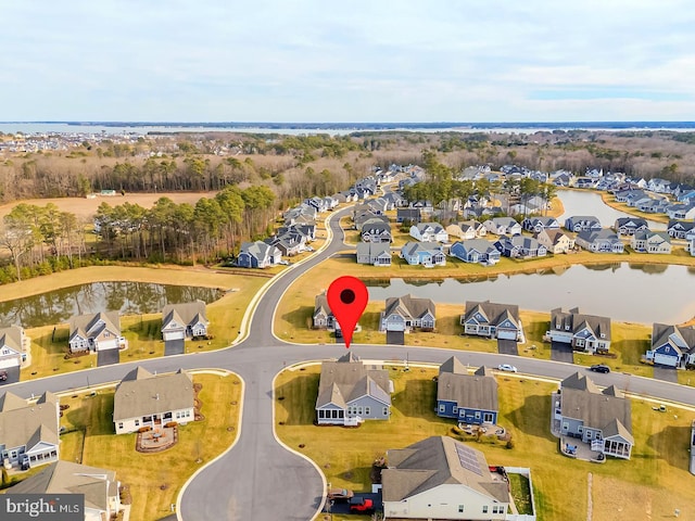 aerial view featuring a residential view and a water view