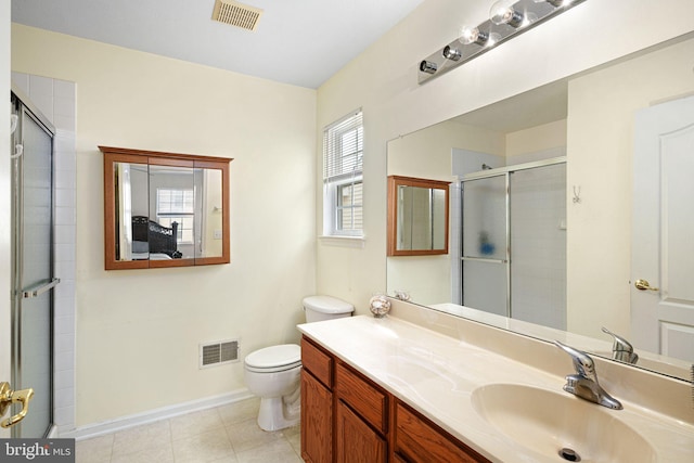 full bath with visible vents, toilet, a stall shower, and vanity