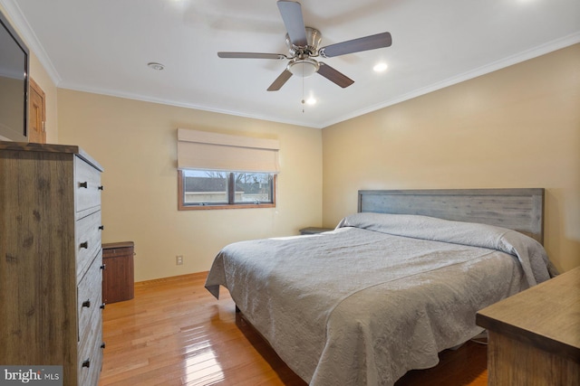 bedroom featuring crown molding, recessed lighting, a ceiling fan, and light wood finished floors