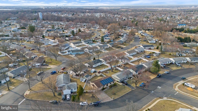 birds eye view of property with a residential view