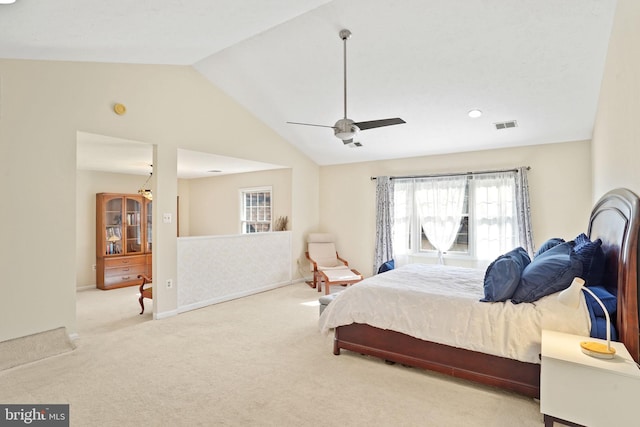 bedroom with visible vents, carpet flooring, baseboards, ceiling fan, and vaulted ceiling