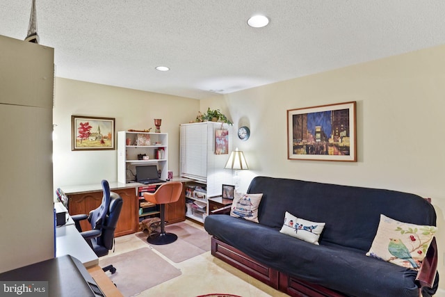 office space featuring recessed lighting and a textured ceiling