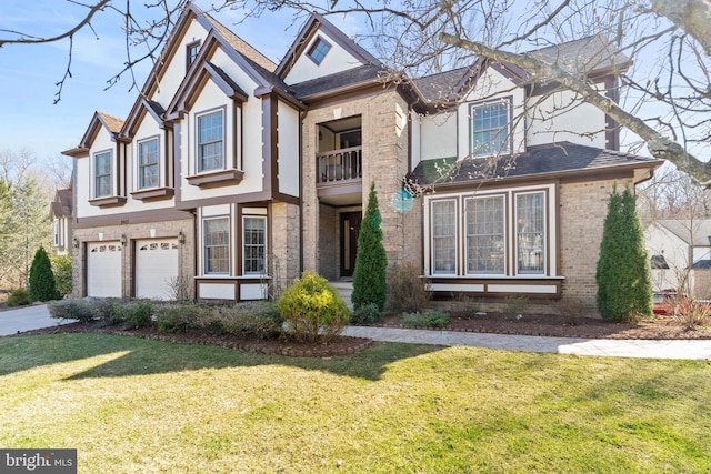 view of front of home with brick siding, a front yard, stucco siding, a garage, and driveway