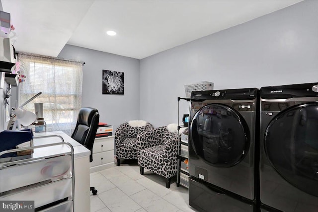 laundry room with laundry area, recessed lighting, and separate washer and dryer