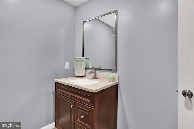 bathroom featuring visible vents and vanity