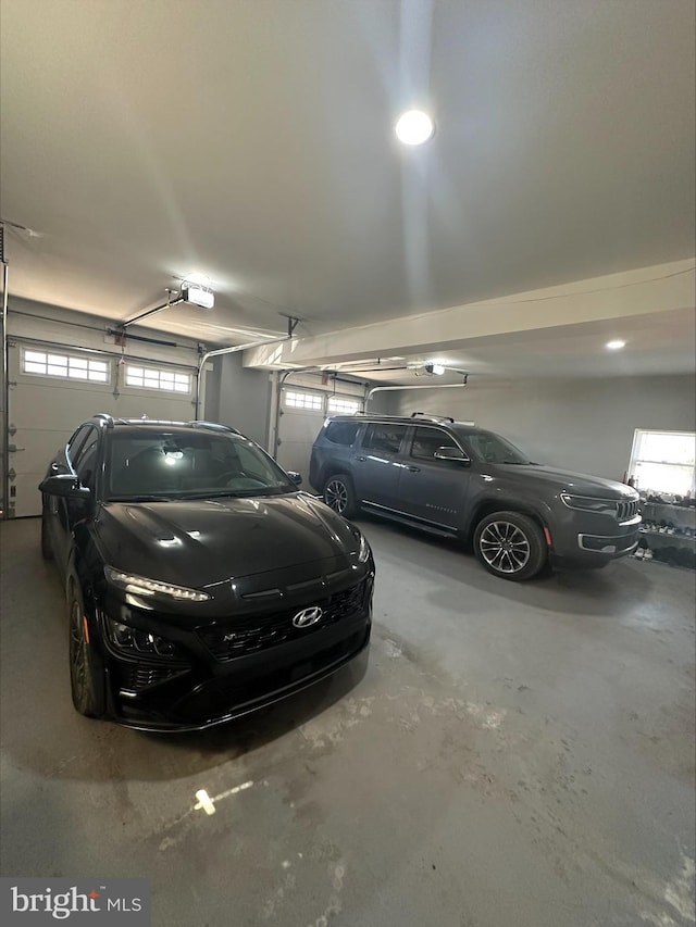 garage featuring a garage door opener