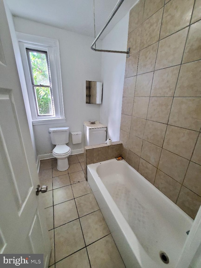 bathroom with tile patterned floors and toilet