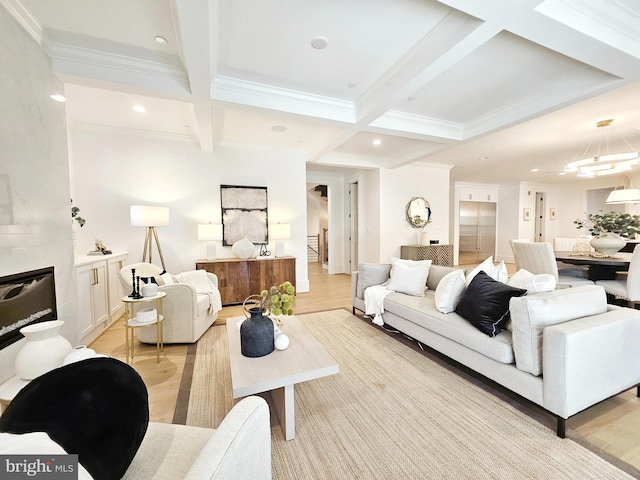 living area featuring light wood-type flooring, ornamental molding, beam ceiling, recessed lighting, and coffered ceiling