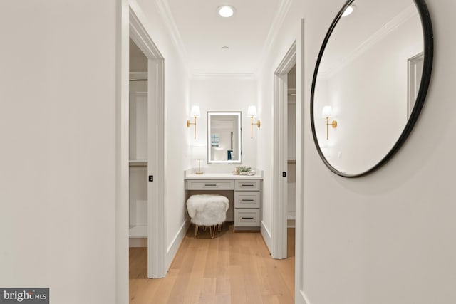 interior space featuring light wood finished floors, recessed lighting, crown molding, and baseboards