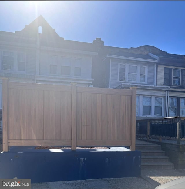 view of front of property with fence