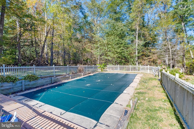 view of swimming pool featuring fence private yard and a fenced in pool