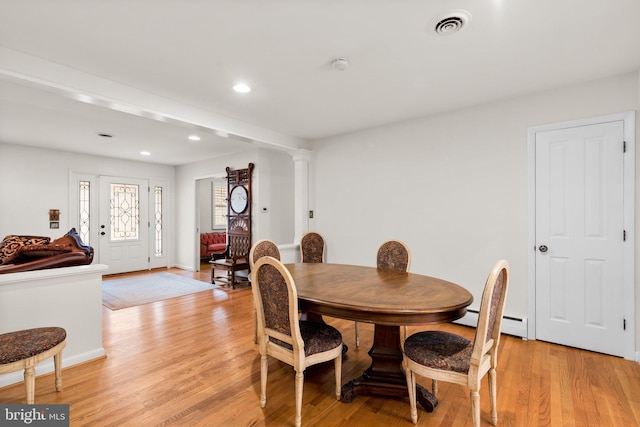 dining space with visible vents, recessed lighting, light wood finished floors, decorative columns, and baseboards