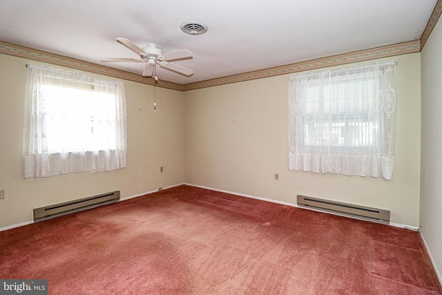 carpeted spare room featuring a baseboard radiator, visible vents, ornamental molding, and a ceiling fan