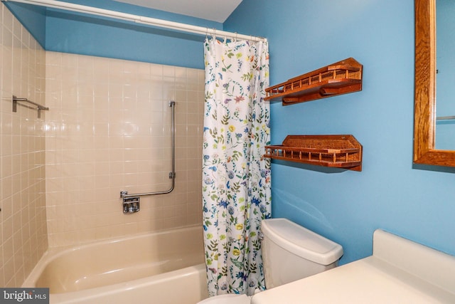 bathroom with toilet and shower / tub combo with curtain