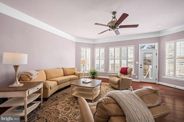 living area featuring crown molding, baseboards, recessed lighting, wood finished floors, and a ceiling fan